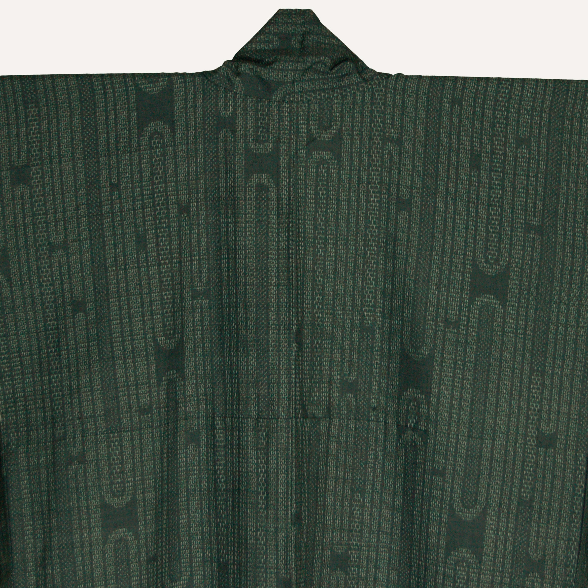 濃いグリーン紬小紋 | 長野県松本市の和服のお手入れ専門 京屋